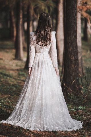 Abito da sposa pudica naturale a terra originale in pizzo abbagliante