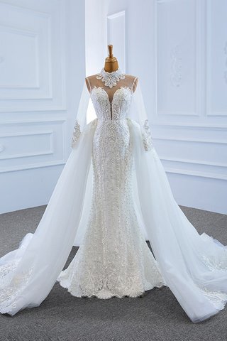 Abito da sposa in pizzo naturale meravigliosa a sala con perline allacciato