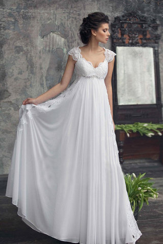 Abito da sposa in chiffon attraente premaman a riva a terra favola